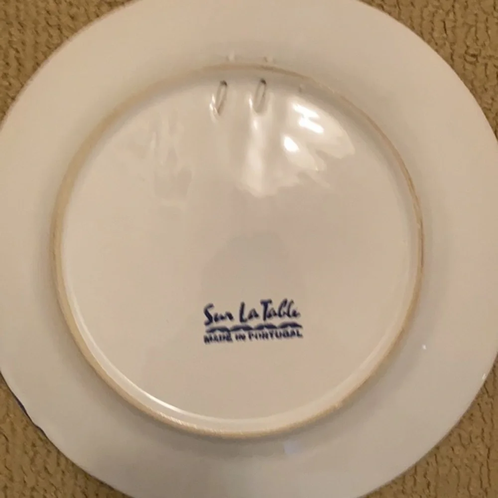 Sur La Table  Quimper 10” wall decor  plate made in Portugal- sitting woman